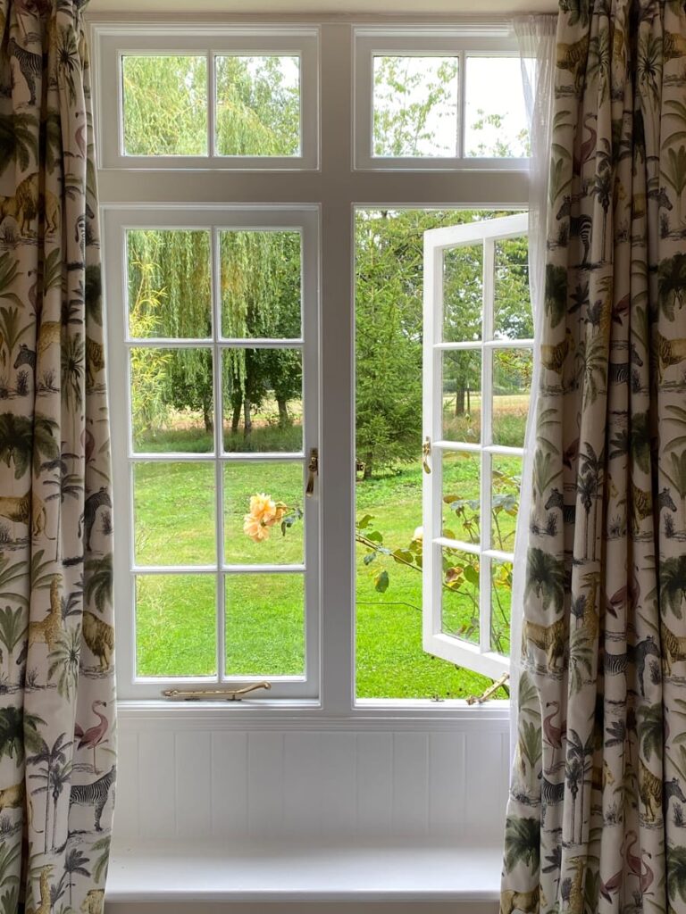 Window overlooking the gardens at Guyers House Hotel